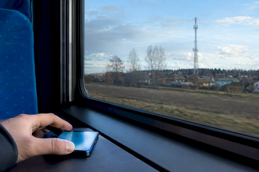 Traveler checking connectivity on Belarus train