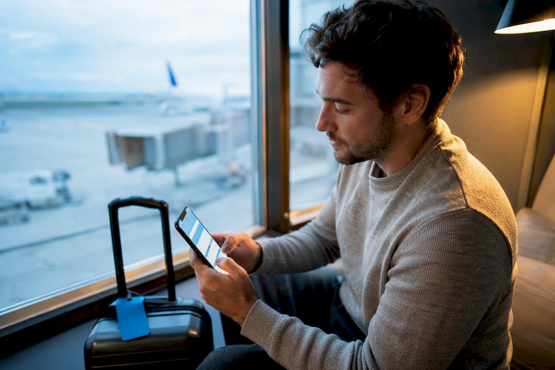 Traveler preparing an eSIM before departure