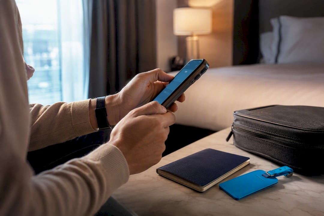 Traveler installing an eSIM before flying