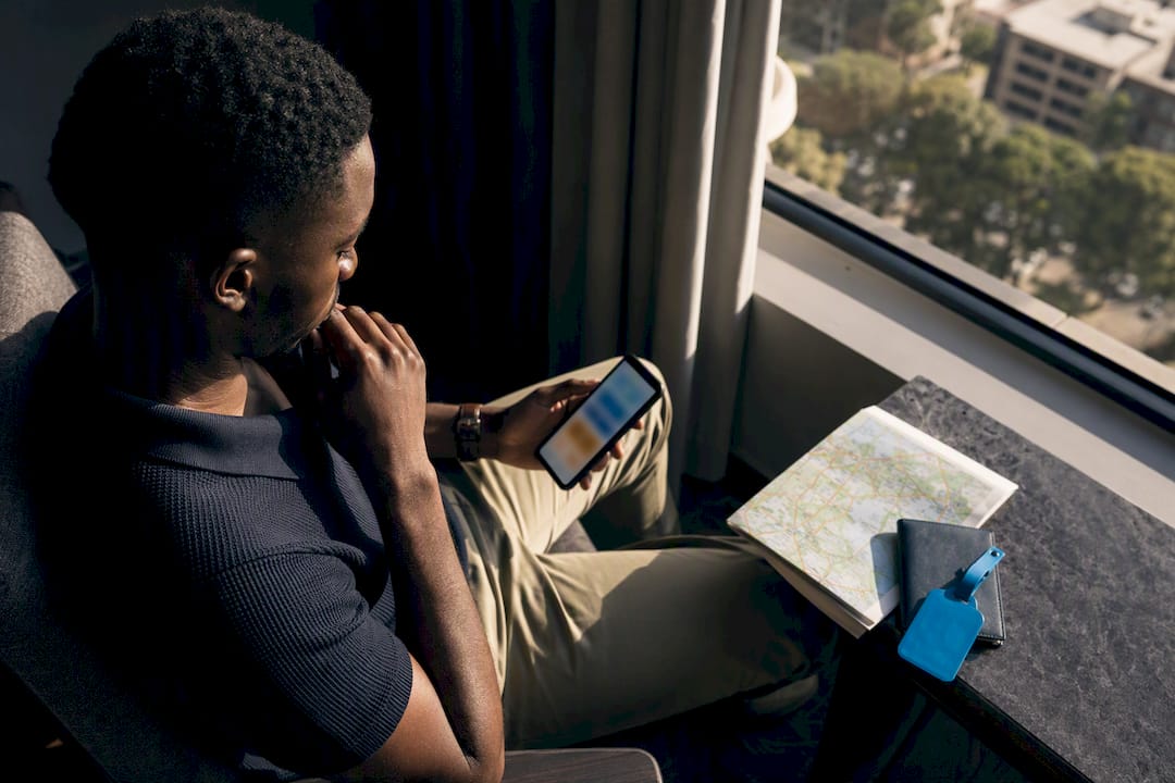 Traveler choosing mobile connectivity before Kenya trip
