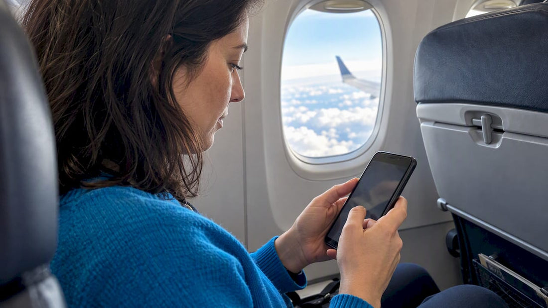 Traveler selecting a USA eSIM in flight
